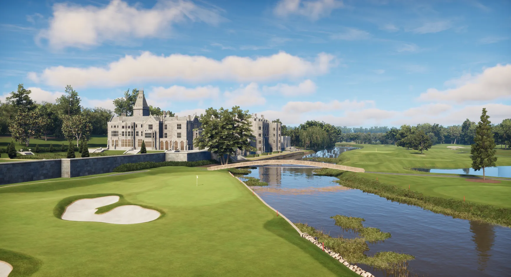 Adare Manor golf course with a sand trap, lush green fairway, river, and a large stone building in the background.